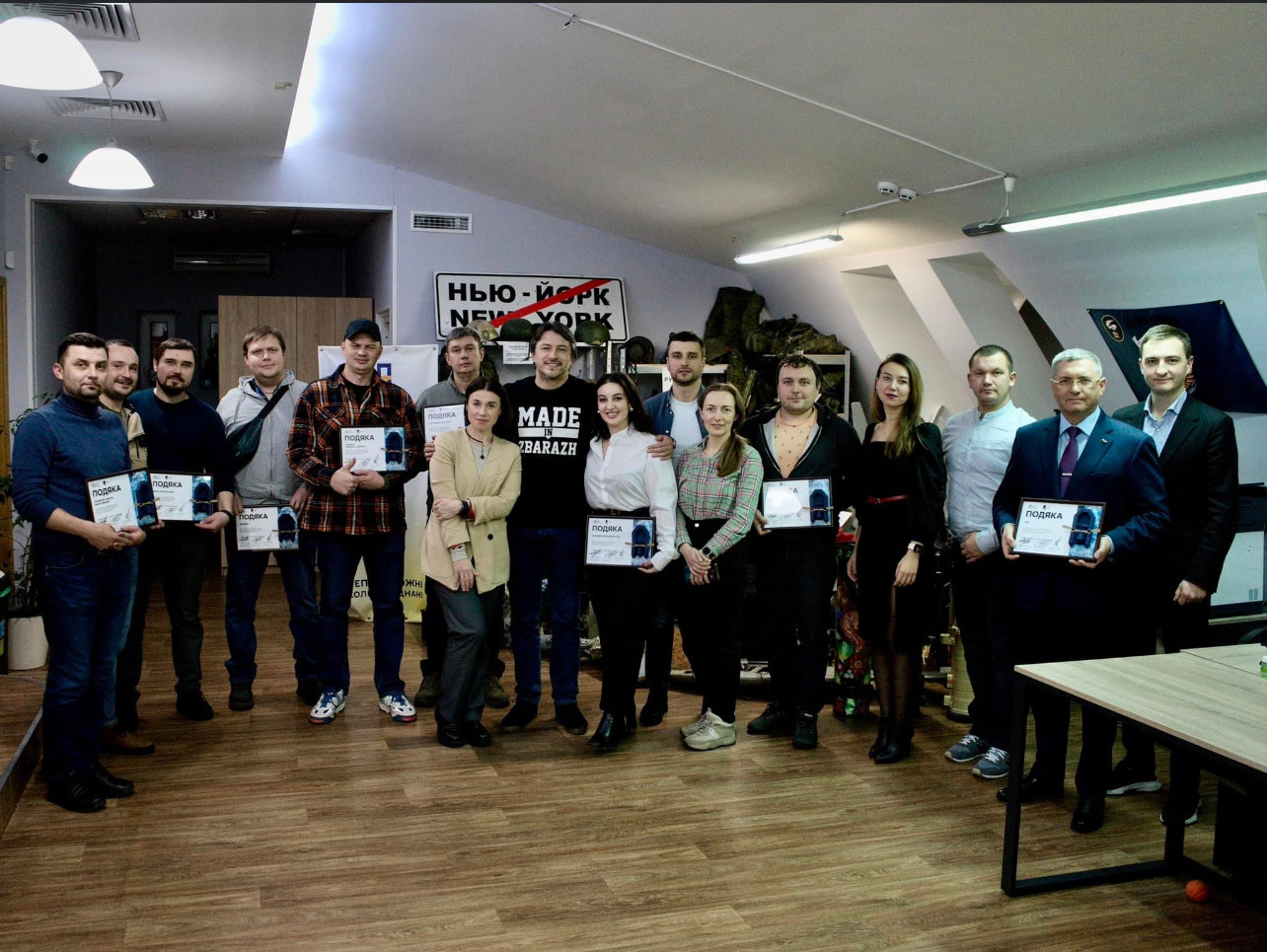 Awarding participants of a charity initiative